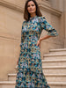 idley_London_Black_Teal_Tropical_Babylon_Liberty_Print_Silk_Satin_Jacqueline_Maxi_Bespoke_Wedding_Guest_Mother_of_The_Bride_Dress_With_Ruffled_High_Necked_Collar_Tiered_Skirt_And_Three_Quarter_Length_Sleeves